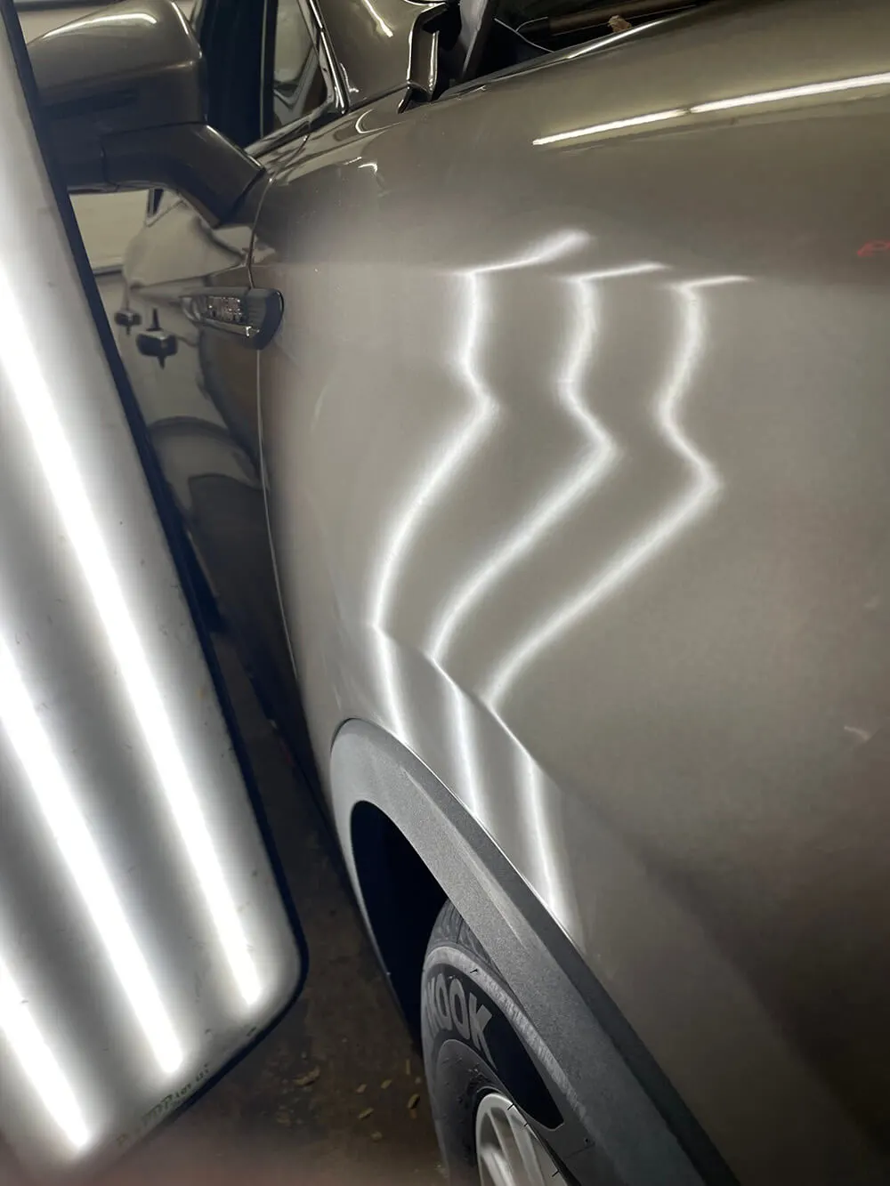 Lincoln-Nautilus-Fender-After-Paintless-Dent-Repair-scaled